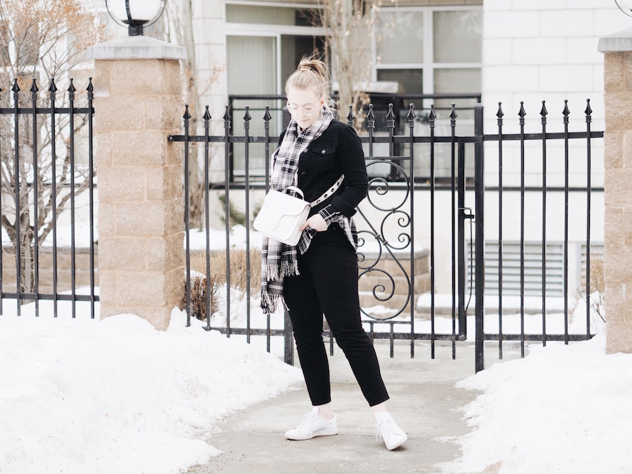 Matching Plaid and black denim pieces with straight leg jeans and white accessories