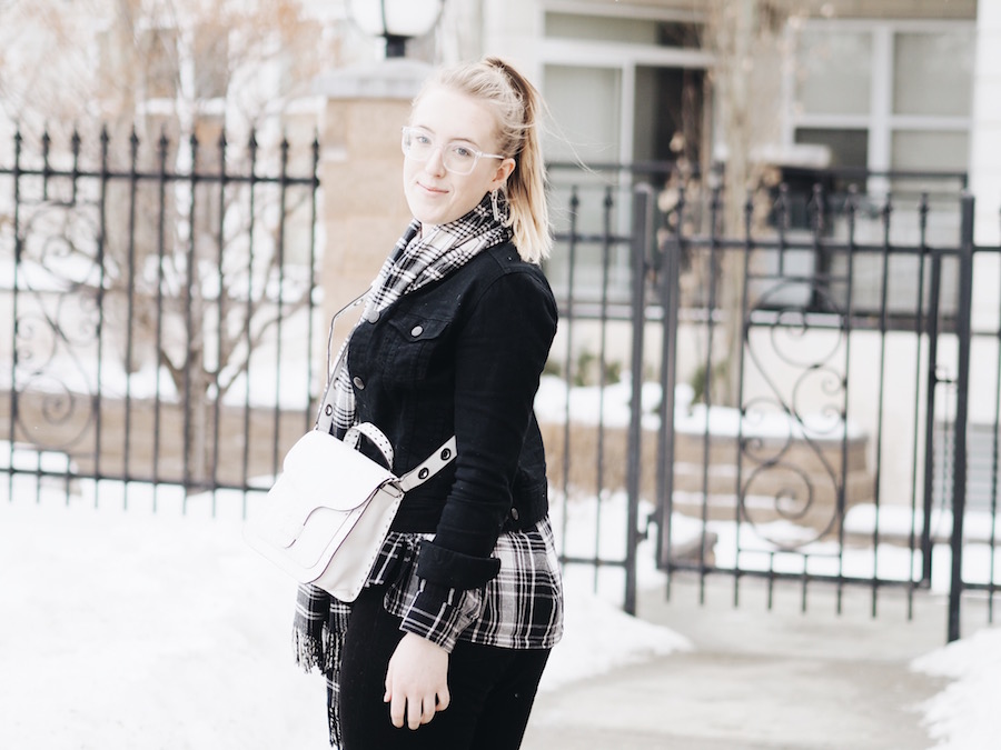 Matching Plaid and black denim pieces with straight leg jeans and white accessories