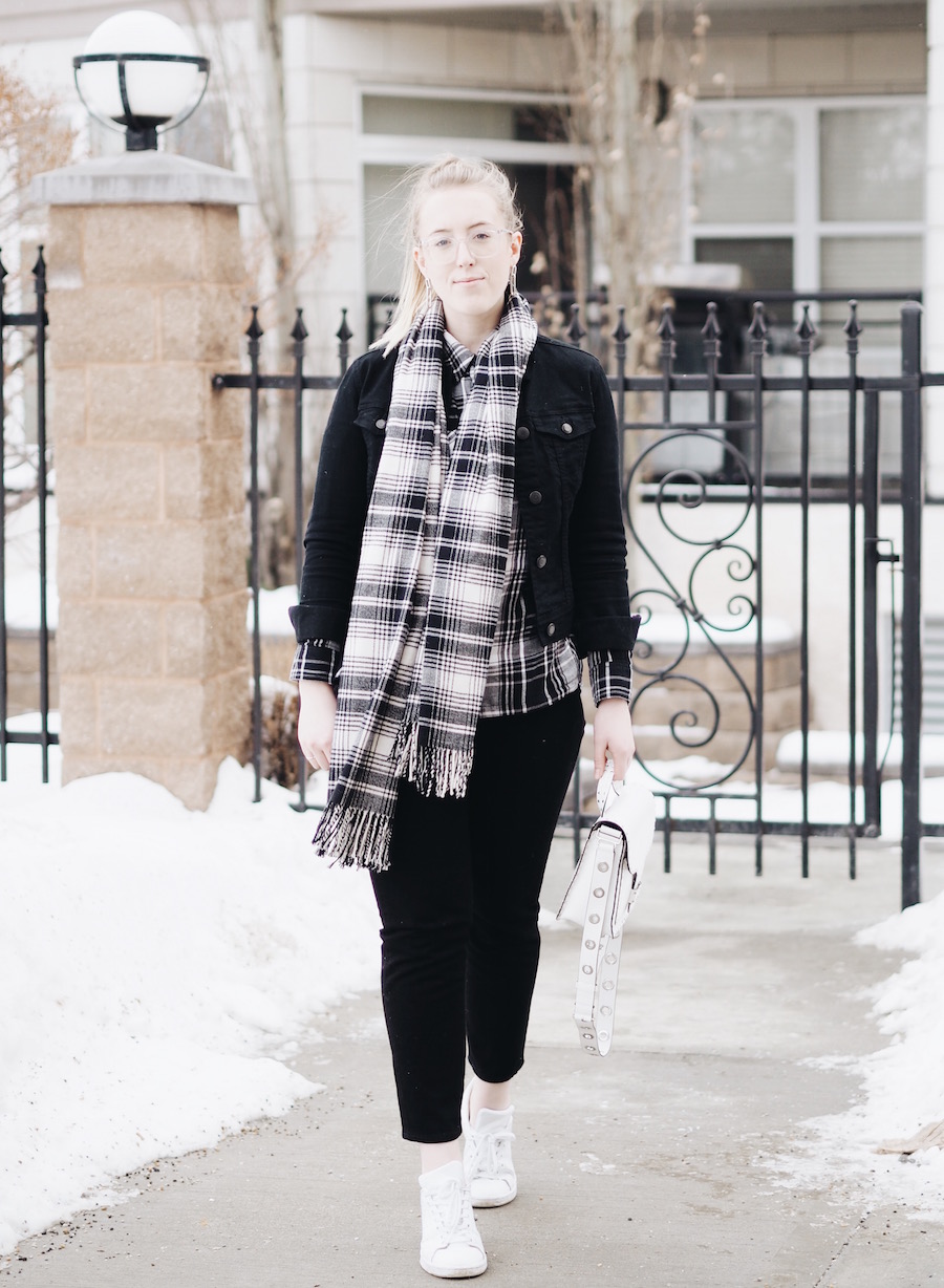 Matching Plaid and black denim pieces with straight leg jeans and white accessories