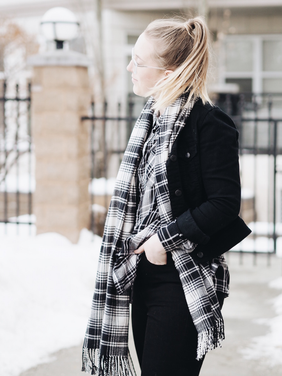 Matching Plaid and black denim pieces with straight leg jeans and white accessories