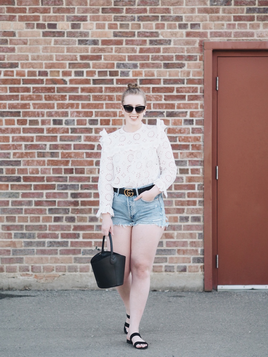 Summer style ruffled top with denim cutoff shorts