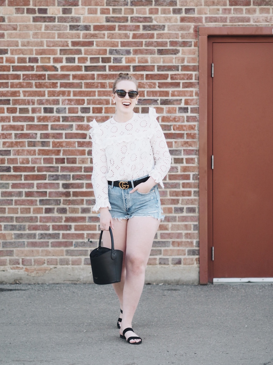 Summer style ruffled top with denim cutoff shorts