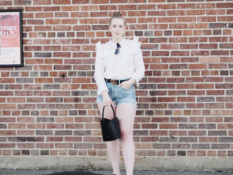 Summer style ruffled top with denim cutoff shorts