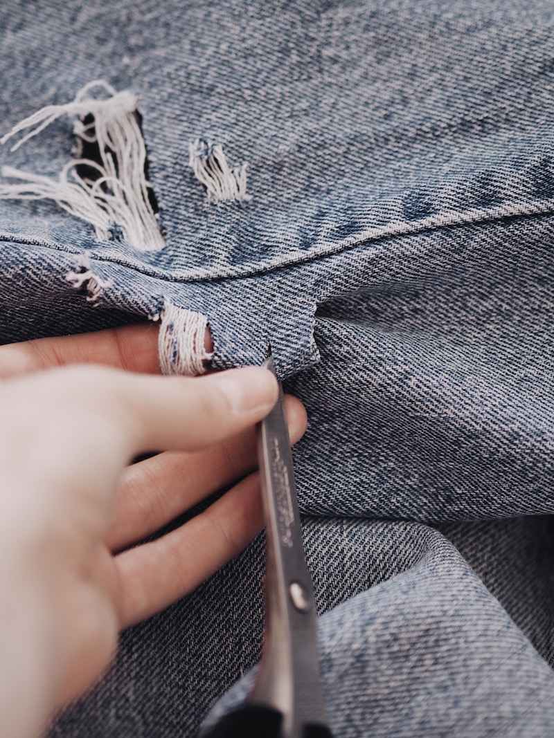 distressing jeans with sandpaper
